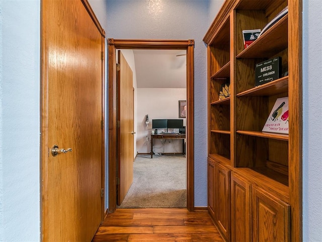 4821 SE 52nd St, Oklahoma City, OK 73135 - hallway with an office area, wood finished floors, and a textured wall