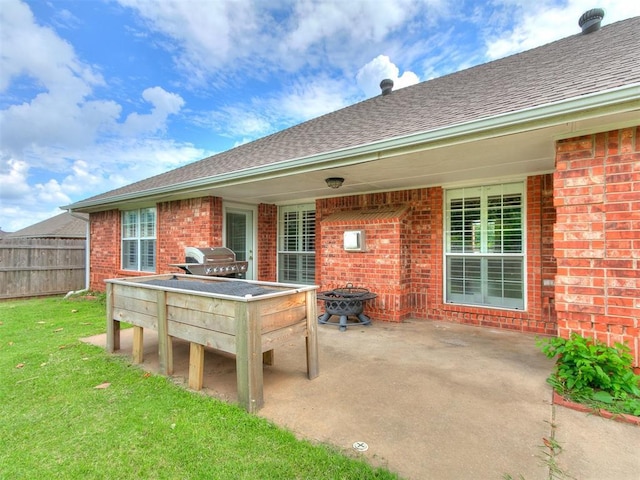 4821 SE 52nd St, Oklahoma City, OK 73135 - view of patio featuring a grill and a fire pit