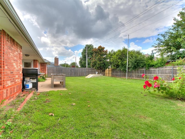 4821 SE 52nd St, Oklahoma City, OK 73135 - fenced backyard with a patio