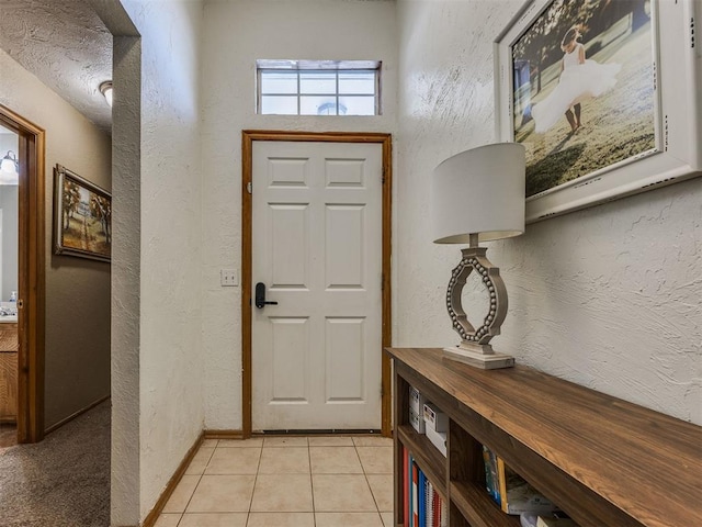 12320 NW 4th St, Yukon, OK 73099 - entryway featuring a textured wall and light tile patterned floors