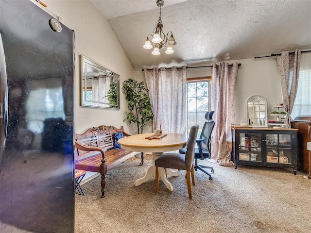 12320 NW 4th St, Yukon, OK 73099 - dining space featuring carpet, vaulted ceiling, a chandelier, and a textured ceiling