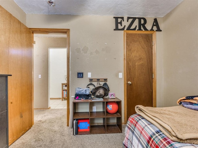 12320 NW 4th St, Yukon, OK 73099 - carpeted bedroom with a textured ceiling