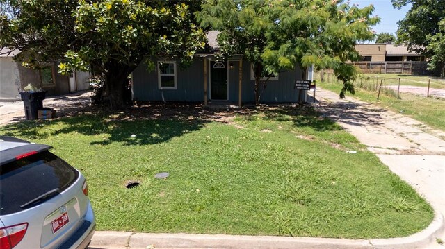 5717 S Francis Ave, Oklahoma City, OK 73109 - obstructed view of property with driveway