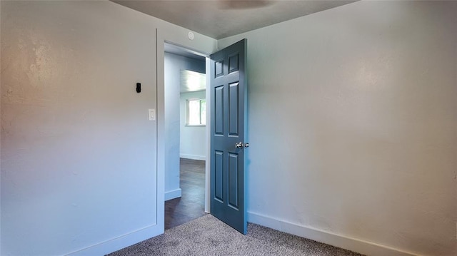 5717 S Francis Ave, Oklahoma City, OK 73109 - carpeted empty room featuring baseboards