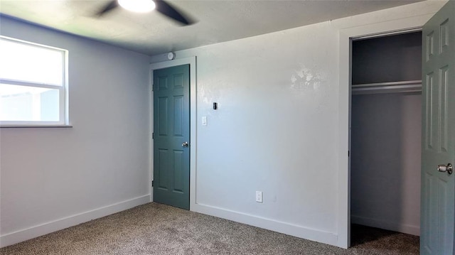 5717 S Francis Ave, Oklahoma City, OK 73109 - unfurnished bedroom featuring carpet flooring, a closet, and a ceiling fan
