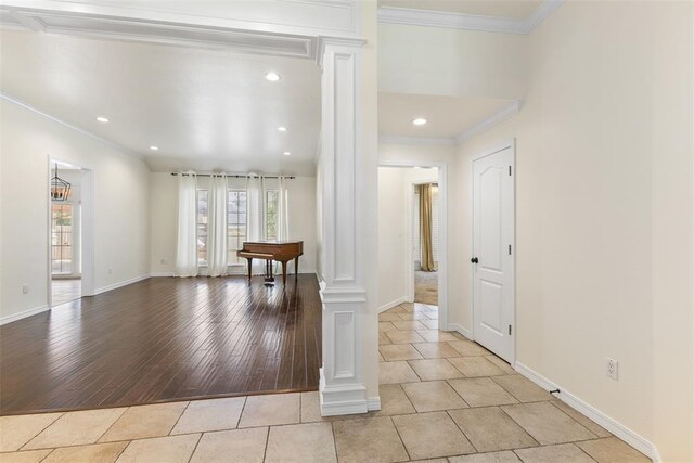 1505 S Augusta Dr, Ada, OK 74820 - unfurnished room featuring decorative columns, ornamental molding, recessed lighting, and light tile patterned floors