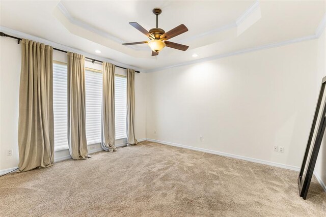 1505 S Augusta Dr, Ada, OK 74820 - unfurnished room with a raised ceiling, ornamental molding, light colored carpet, a ceiling fan, and recessed lighting