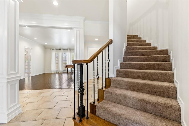 1505 S Augusta Dr, Ada, OK 74820 - staircase with tile patterned flooring, recessed lighting, and crown molding