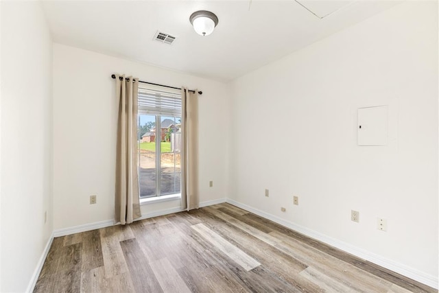 1505 S Augusta Dr, Ada, OK 74820 - empty room with wood finished floors and baseboards