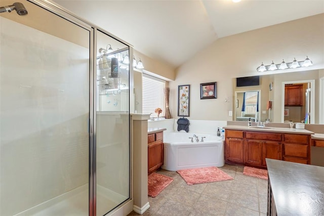 2308 SW 135th St, Oklahoma City, OK 73170 - bathroom featuring a shower stall, lofted ceiling, vanity, a bath, and tile patterned flooring