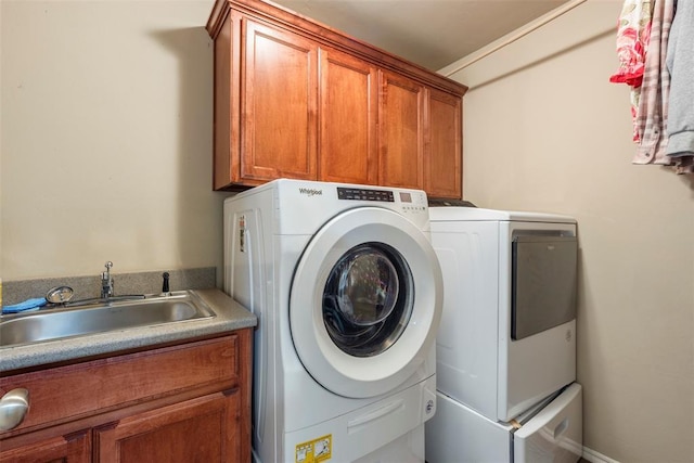 2308 SW 135th St, Oklahoma City, OK 73170 - laundry room with cabinet space and washing machine and clothes dryer