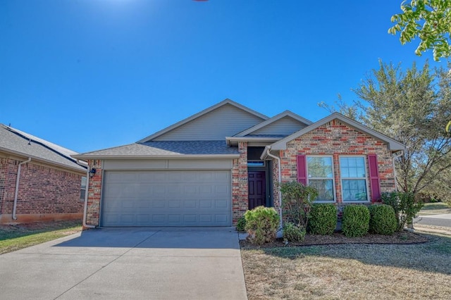 9544 SW 27th St, Oklahoma City, OK 73128 - ranch-style home with driveway, an attached garage, and brick siding