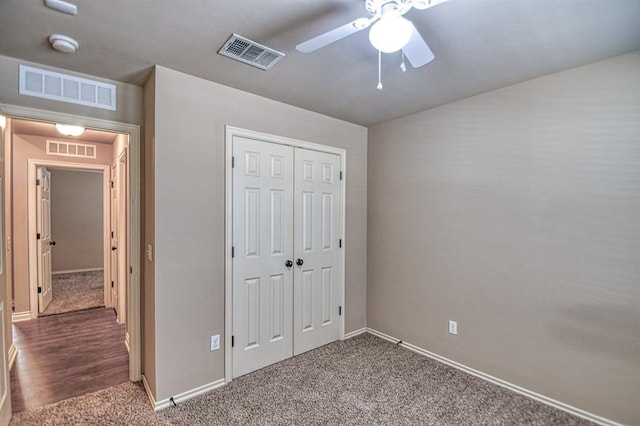 9544 SW 27th St, Oklahoma City, OK 73128 - unfurnished bedroom with carpet, a closet, and a ceiling fan