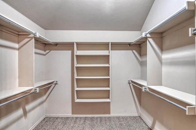 9544 SW 27th St, Oklahoma City, OK 73128 - spacious closet featuring carpet floors