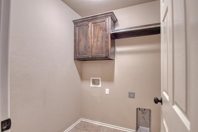 9544 SW 27th St, Oklahoma City, OK 73128 - washroom featuring washer hookup, hookup for an electric dryer, and cabinet space