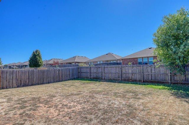 9544 SW 27th St, Oklahoma City, OK 73128 - fenced backyard featuring a residential view