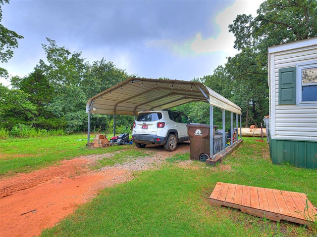15251 E Waterloo Rd, Arcadia, OK 73007 - view of car parking with driveway and a detached carport