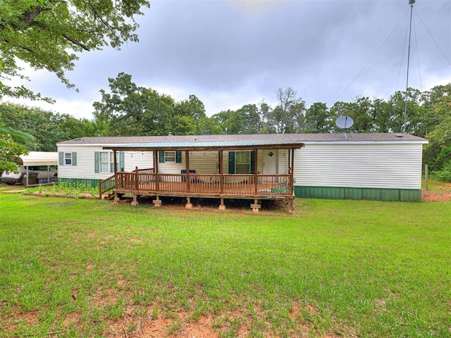 15251 E Waterloo Rd, Arcadia, OK 73007 - rear view of house featuring a lawn and a deck