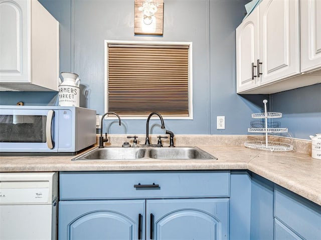 15251 E Waterloo Rd, Arcadia, OK 73007 - kitchen with white appliances, white cabinets, and light countertops
