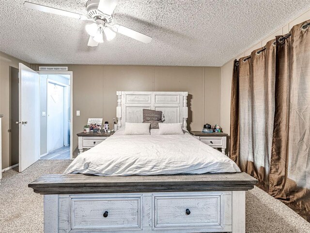 15251 E Waterloo Rd, Arcadia, OK 73007 - bedroom with carpet, a textured ceiling, and a ceiling fan