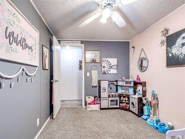 15251 E Waterloo Rd, Arcadia, OK 73007 - recreation room with carpet, a textured ceiling, and a ceiling fan