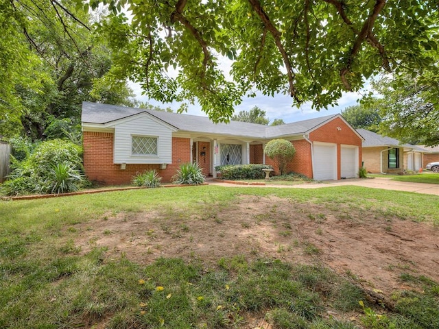 2400 NW 111th St, Oklahoma City, OK 73120 - single story home featuring brick siding, an attached garage, concrete driveway, and a front lawn