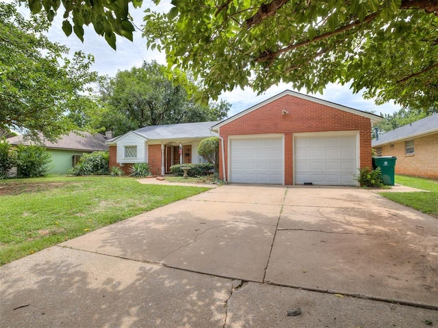 2400 NW 111th St, Oklahoma City, OK 73120 - ranch-style home featuring brick siding and a front lawn