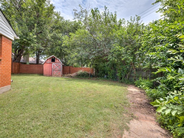 2400 NW 111th St, Oklahoma City, OK 73120 - fenced backyard featuring a storage shed