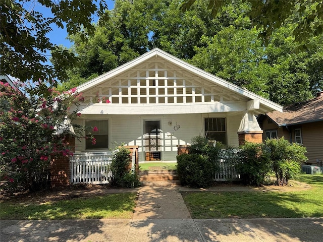 415 N Wentz St, Guthrie, OK 73044 - bungalow-style home with a porch and brick siding