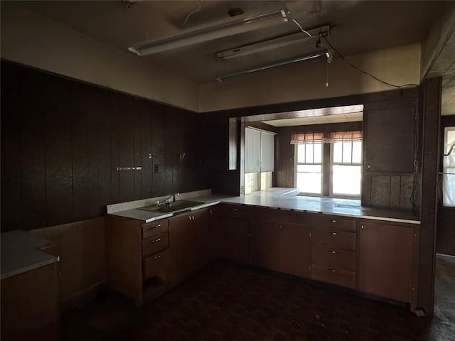 415 N Wentz St, Guthrie, OK 73044 - kitchen featuring wood walls and light countertops