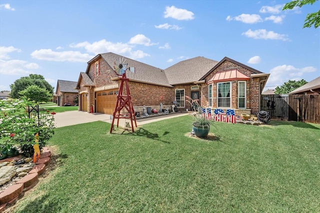 13117 SW 2nd Ter, Yukon, OK 73099 - back of house with an attached garage, brick siding, concrete driveway, and a shingled roof