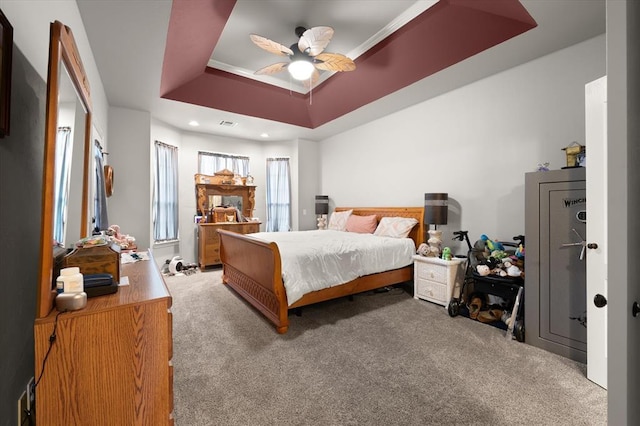 13117 SW 2nd Ter, Yukon, OK 73099 - carpeted bedroom with a tray ceiling, recessed lighting, and ceiling fan