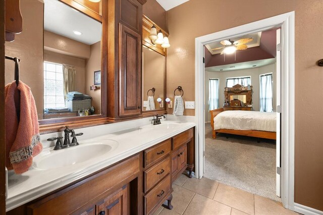 13117 SW 2nd Ter, Yukon, OK 73099 - full bathroom with ensuite bathroom, double vanity, tile patterned flooring, and plenty of natural light