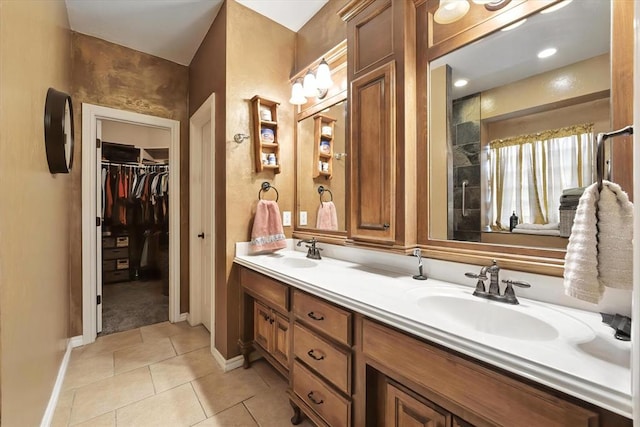 13117 SW 2nd Ter, Yukon, OK 73099 - full bathroom with double vanity, tile patterned flooring, and a walk in closet
