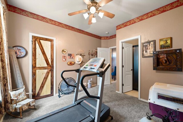 13117 SW 2nd Ter, Yukon, OK 73099 - workout room with carpet flooring and a ceiling fan