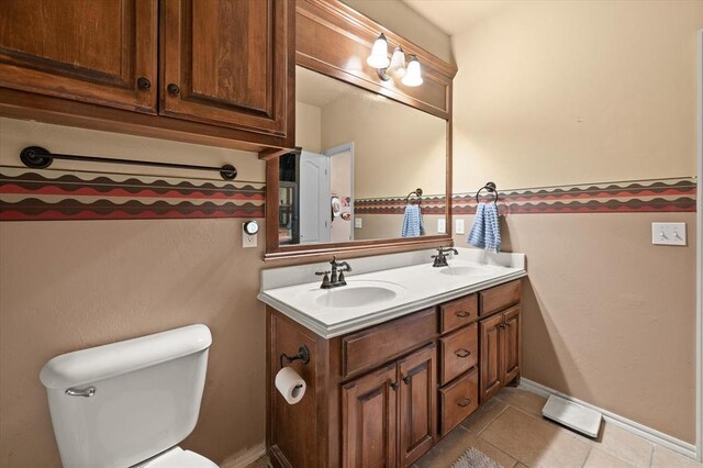 13117 SW 2nd Ter, Yukon, OK 73099 - bathroom featuring double vanity and tile patterned flooring