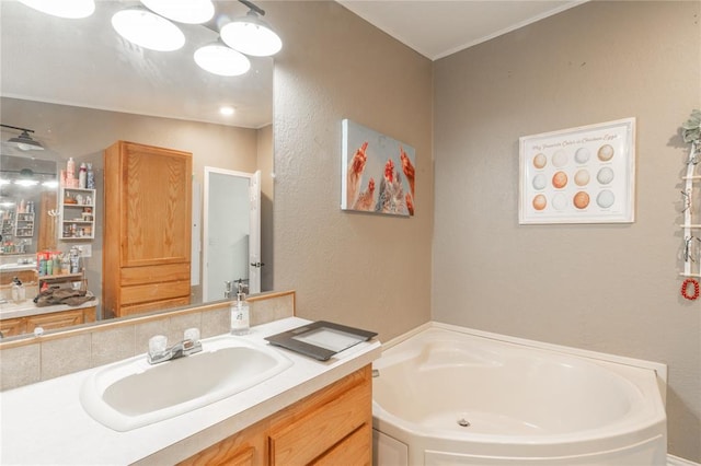 1300 Hutton Rd, Marlow, OK 73055 - full bathroom with vanity, a bath, and a textured wall