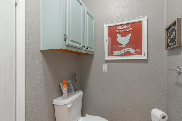 1300 Hutton Rd, Marlow, OK 73055 - bathroom with toilet and a textured wall