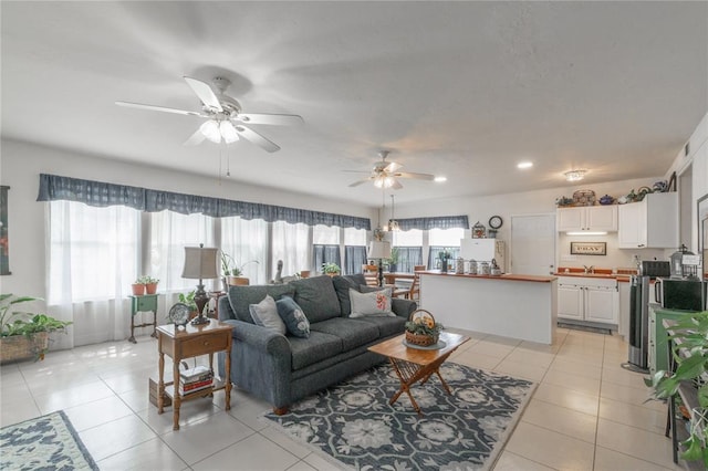 1300 Hutton Rd, Marlow, OK 73055 - living area featuring light tile patterned flooring, ceiling fan, and recessed lighting