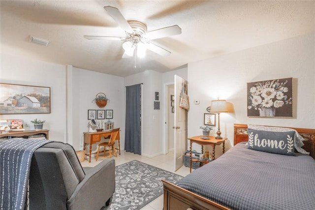 1300 Hutton Rd, Marlow, OK 73055 - bedroom with light tile patterned floors and a ceiling fan
