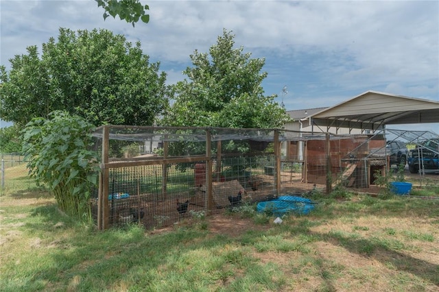 1300 Hutton Rd, Marlow, OK 73055 - view of yard with exterior structure and a detached carport