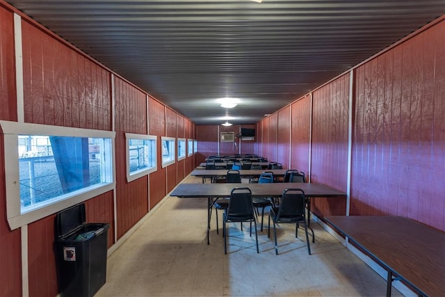 105074 N 3770th Rd, Okemah, OK 74859 - dining area featuring wooden walls and light floors