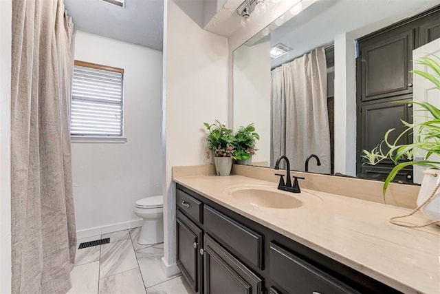 2401 Big Cedar Ave, Edmond, OK 73012 - full bathroom with vanity and marble look tiles