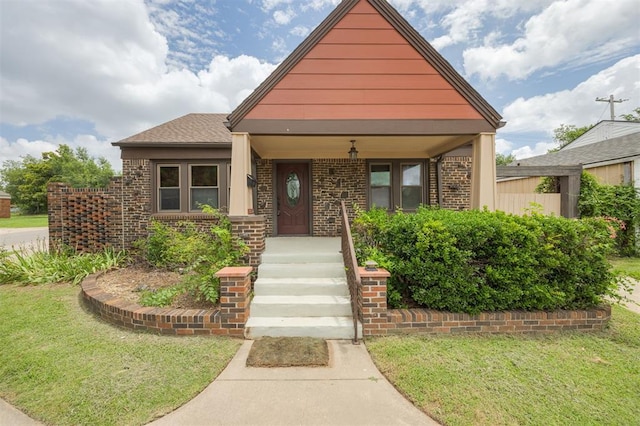 3824 Key Pl, Oklahoma City, OK 73112 - bungalow-style home featuring a front yard and brick siding