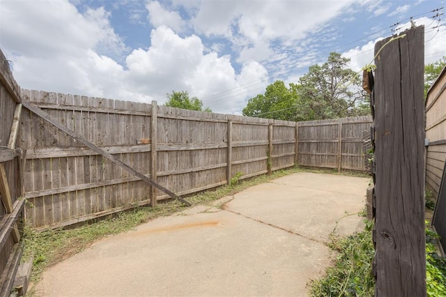 3824 Key Pl, Oklahoma City, OK 73112 - fenced backyard with a patio area
