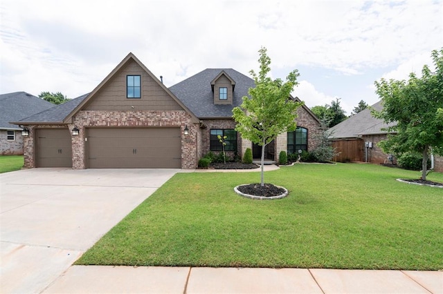 512 NW 186th St, Edmond, OK 73012 - craftsman inspired home with brick siding, a front yard, an attached garage, concrete driveway, and a shingled roof