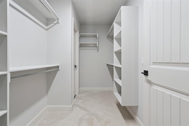 512 NW 186th St, Edmond, OK 73012 - walk in closet featuring carpet floors
