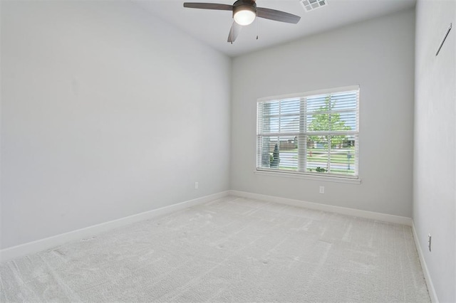 512 NW 186th St, Edmond, OK 73012 - spare room with a ceiling fan and light colored carpet