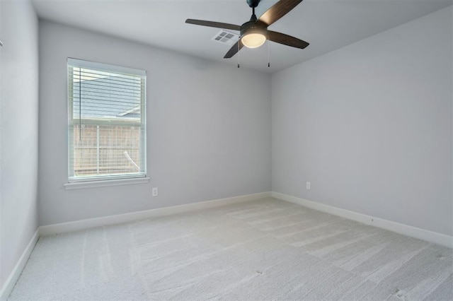 512 NW 186th St, Edmond, OK 73012 - carpeted spare room featuring baseboards and a ceiling fan