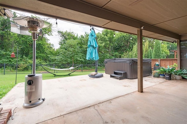 512 NW 186th St, Edmond, OK 73012 - fenced backyard with a hot tub, a patio area, and view of scattered trees